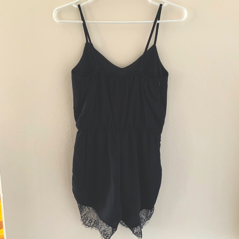 Black romper with lace detailing